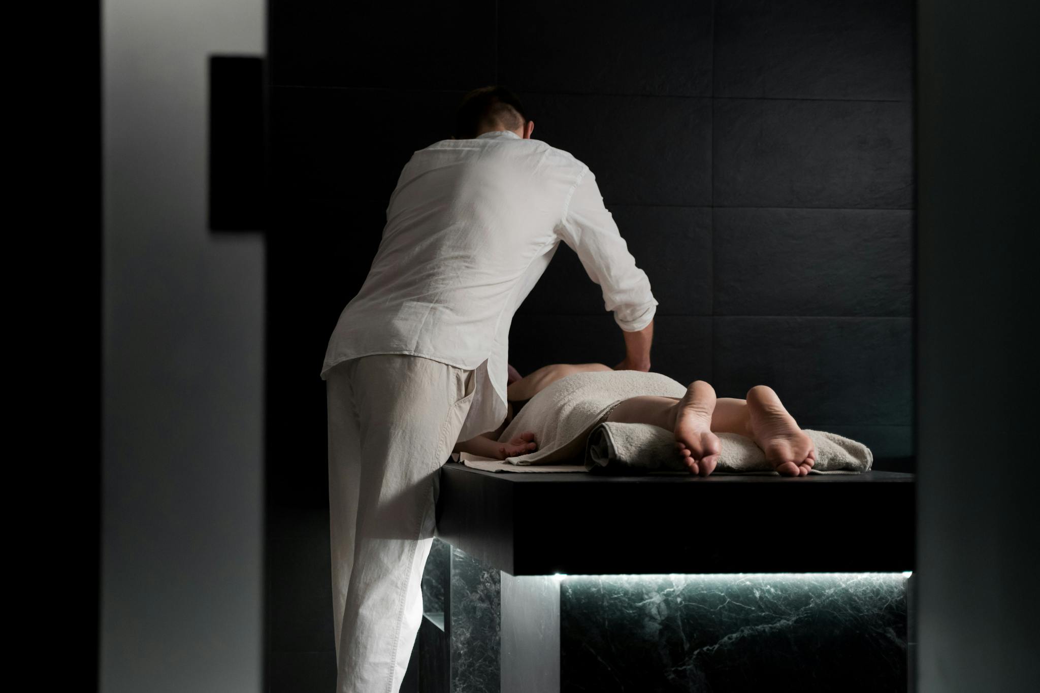 A relaxing massage in a spa setting focusing on soothing therapy and wellbeing.